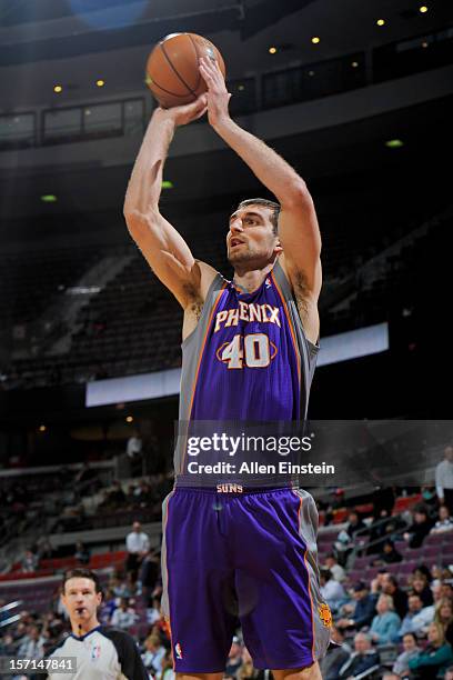 Luke Zeller of the Phoenix Suns shoots against the Detroit Pistons on November 28, 2012 at The Palace of Auburn Hills in Auburn Hills, Michigan. NOTE...