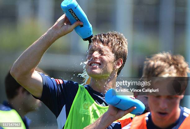 Adrian Leijer of the victory cools down in the hot conditions during a Melbourne Victory A-League training session at Gosch's Paddock on November 29,...