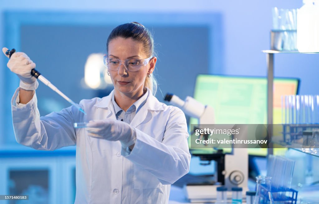 Lab Making Woman With Pipettes And Test Tubes In Chemistry Laboratory Making ...