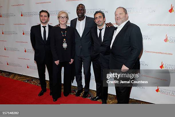 Olivier Nakache, Meryl Streep, Omar Sy, and Eric Toledano and Harvey Weinstein attend the Christopher & Dana Reeve Foundation's A Magical Evening...