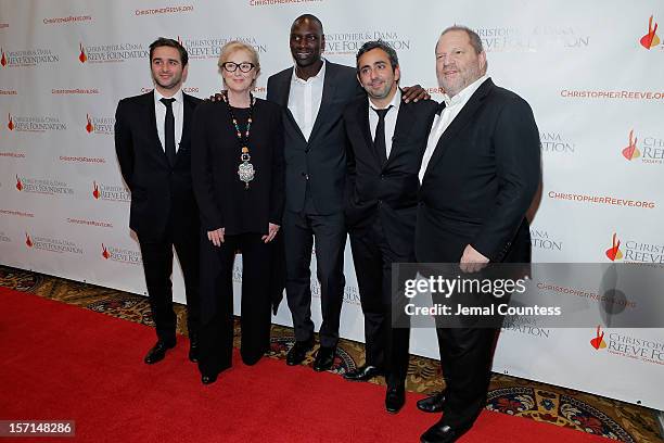 Olivier Nakache, Meryl Streep, Omar Sy, and Eric Toledano and Harvey Weinstein attend the Christopher & Dana Reeve Foundation's A Magical Evening...