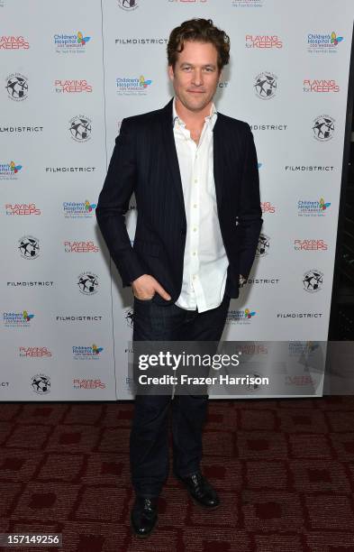 Actor James Tupper arrives at the special Children's Hospital Los Angeles' Benefit screening of "Playing For Keeps" at ArcLight Hollywood on November...