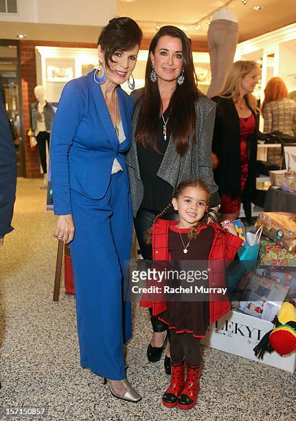 Safe Passage Founder Trish Steele, Kyle Richards, and Portia Umansky attend Kyle By Alene Too holiday shopping event featuring Bullets For Peace...