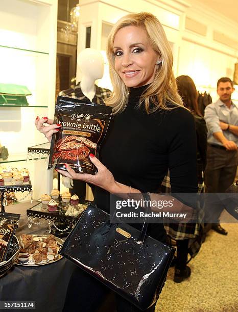 Camille Grammer attends Kyle By Alene Too holiday shopping event featuring Bullets For Peace benefiting Safe Passage Charity on November 28, 2012 in...