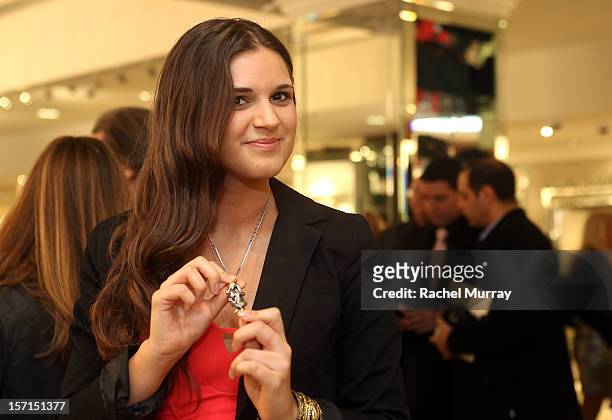 Guests attend Kyle By Alene Too holiday shopping event featuring Bullets For Peace benefiting Safe Passage Charity on November 28, 2012 in Beverly...