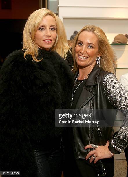 Tv personality Camille Grammer and Alene Too co-founder Debbie Weisman attend Kyle By Alene Too holiday shopping event featuring Bullets For Peace...