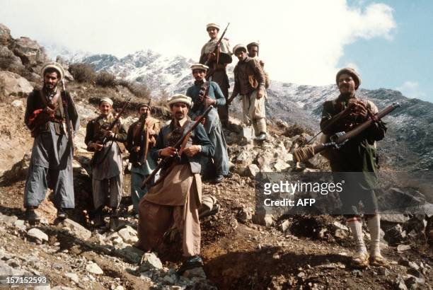 This picture taken in the early 80s shows the premier groups of the Afghan anti-Soviet resistance fighters with their primitive arms in the eastern...