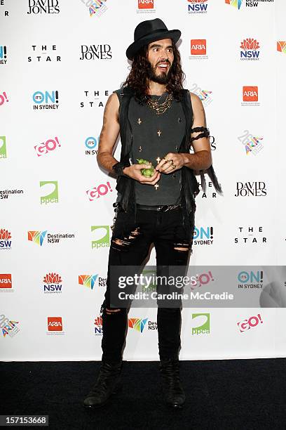 Russell Brand poses in the awards room at the 26th Annual ARIA Awards 2012 at the Sydney Entertainment Centre on November 29, 2012 in Sydney,...