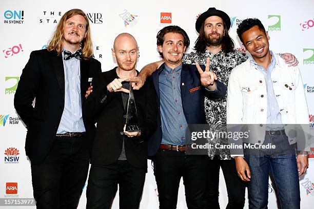 The Temper Trap pose with the ARIA for best Group release at the 26th Annual ARIA Awards 2012 at the Sydney Entertainment Centre on November 29, 2012...