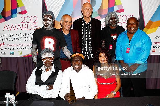 Yothu Yindi, Australian musician, environmentalist, activist and politician Peter Garrett and Paul Kelly pose after Yothu Yindi was inducted into the...