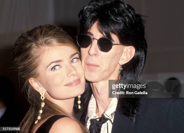 Musician Ric Ocasek and model Paulina Porizkova attending "CFDA Vogue 7th on Sale Fashion Benefit for AIDS" on November 29, 1990 at the Armory in New...