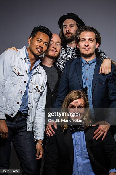 Dougy Mandagi, Joseph Greer, Toby Dundas, Lorenzo Sillitto and Johnny Aherne of The Temper Trap pose after winning the ARIA Award for Best Rock...