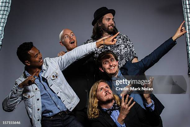 Dougy Mandagi, Joseph Greer, Toby Dundas, Lorenzo Sillitto and Johnny Aherne of The Temper Trap pose after winning the ARIA Award for Best Rock...