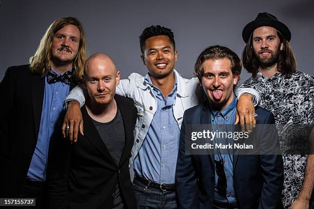 Johnny Aherne, Dougy Mandagi, Lorenzo Sillitto and Toby Dundas of The Temper Trap pose after winning the ARIA Award for Best Rock Release and Best...