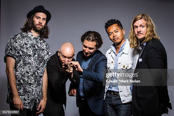 Dougy Mandagi, Jonathon Aherne, Lorenzo Sillitto, Toby Dundas, and Joseph Greer of The Temper Trap pose after winning the ARIA for best group and...