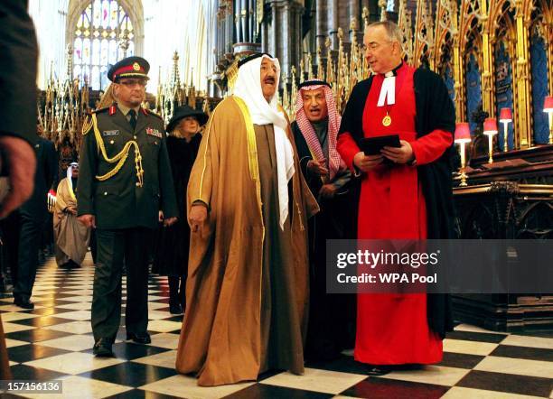 The Amir of the State of Kuwait talks with the Dean of Westminster, The Very Reverend Dr John Hall as he visits Westminster Abbey to lay a wreath at...