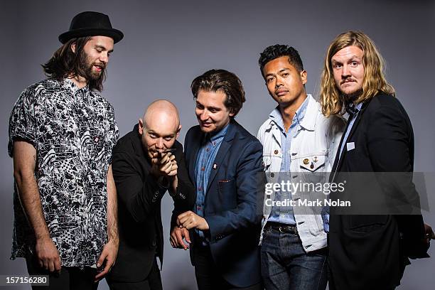 Dougy Mandagi, Jonathon Aherne, Lorenzo Sillitto, Toby Dundas, and Joseph Greer of The Temper Trap pose after winning the ARIA for best group and...