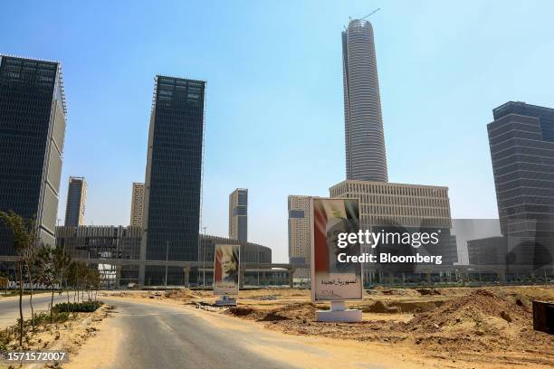 Roadside posters displaying an image of Abdel-Fattah El-Sisi, Egypt's president, in the central business district of Egypt's New Administrative...