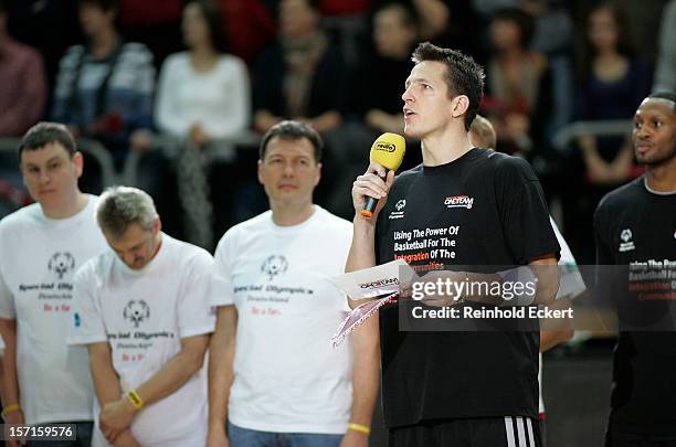 Casey Jacobsen, #23 of Brose Baskets Bamberg and the Special Olympics before the 2012-2013 Turkish Airlines Euroleague Regular Season Game Day 8...