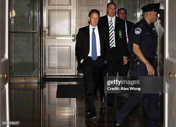 Secretary of Treasury Timothy Geithner walks at the Capitol for meeting with Congressional leaders November 29, 2012 on Capitol Hill in Washington,...