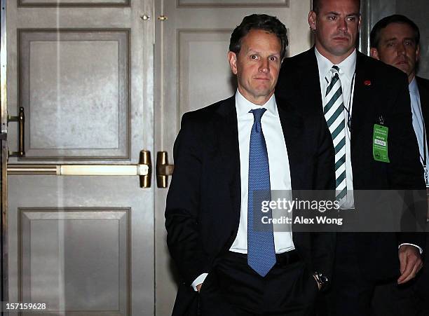 Secretary of Treasury Timothy Geithner walks at the Capitol for meeting with Congressional leaders November 29, 2012 on Capitol Hill in Washington,...