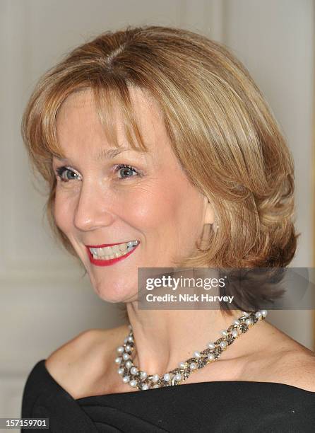 Carrie Cunningham attends a catwalk show and auction hosted by Browns, Harpers Bazaar and H.E. Alain Giorgio Maria Economides in aid of Women for...