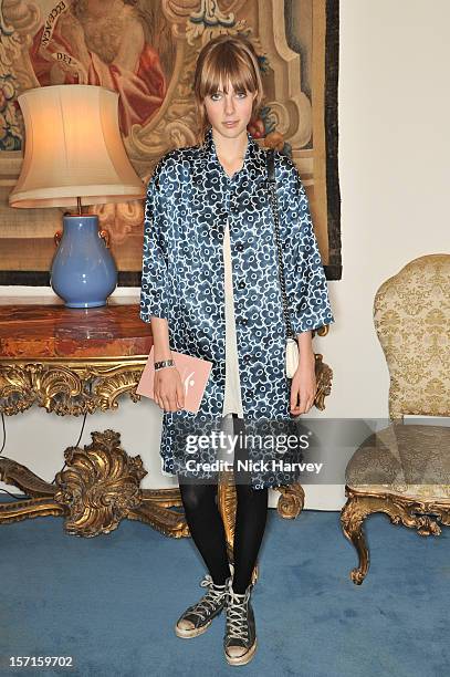 Edie Campbell attends a catwalk show and auction hosted by Browns, Harpers Bazaar and H.E. Alain Giorgio Maria Economides in aid of Women for Women...