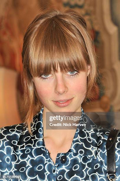 Edie Campbell attends a catwalk show and auction hosted by Browns, Harpers Bazaar and H.E. Alain Giorgio Maria Economides in aid of Women for Women...