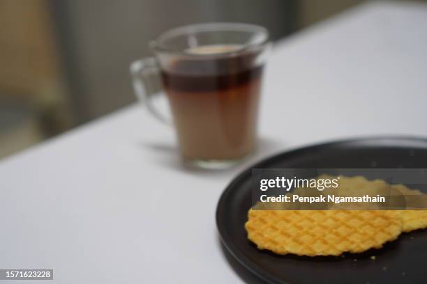 crispy waffle and hot black coffee - close up bread roll black backdrop horizontal stock pictures, royalty-free photos & images