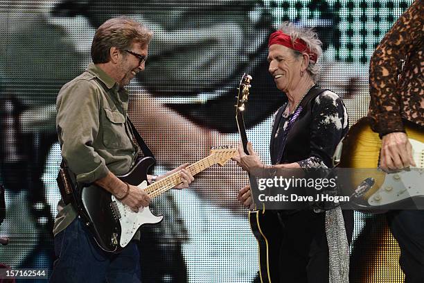 Eric Clapton and Keith Richards of The Rolling Stones perfom at The O2 Arena on November 29, 2012 in London, England.