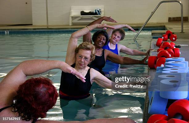 aqua ladies - aqua fitness stock pictures, royalty-free photos & images