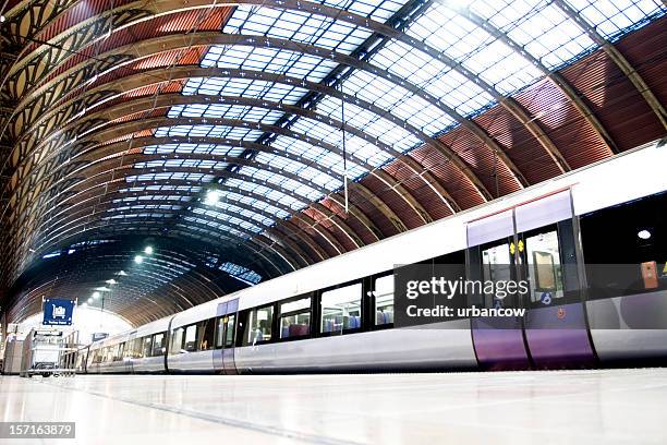 on the platform - train uk stock pictures, royalty-free photos & images