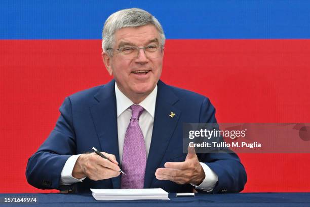 Thomas Bach, President of IOC, signs invitations to Paris 2024 during Invitation Ceremony on July 26, 2023 in Paris, France. Paris will host the...