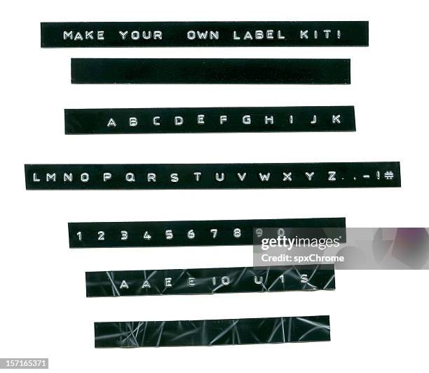 embossed label letters kit - sticky tape stock pictures, royalty-free photos & images