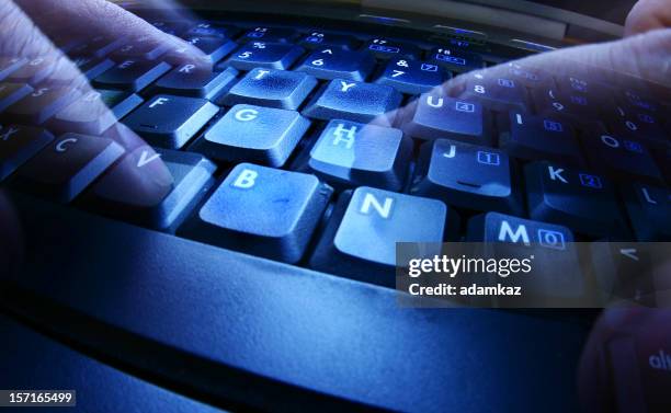 hands typing - cyber war stock pictures, royalty-free photos & images