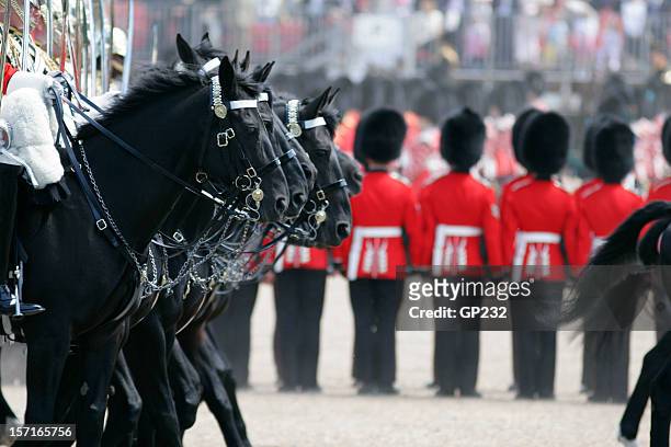 troops of the colors parade celebrating queen's birthday - royalty stockfoto's en -beelden