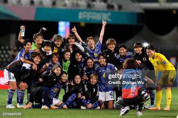 Players of Japan celebrate the victory and take group photo after the FIFA Women's World Cup Australia & New Zealand 2023 Group C match between Japan...