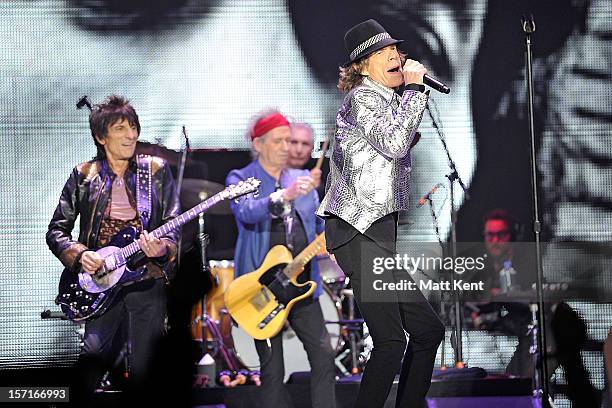 Ronnie Wood, Keith Richards, Charlie Watts and Mick Jagger of The Rolling Stones perform at 02 Arena on November 29, 2012 in London, England.