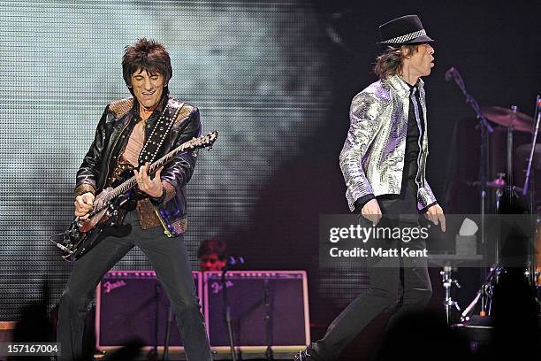 Ronnie Wood and Mick Jagger of The Rolling Stones perform at 02 Arena on November 29, 2012 in London, England.