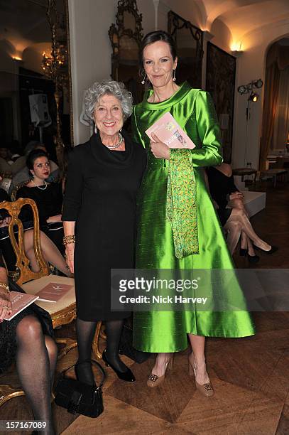 Joan Burstein and Brita Fernandez Schmidt attend a catwalk show and auction hosted by Browns, Harpers Bazaar and H.E. Alain Giorgio Maria Economides...
