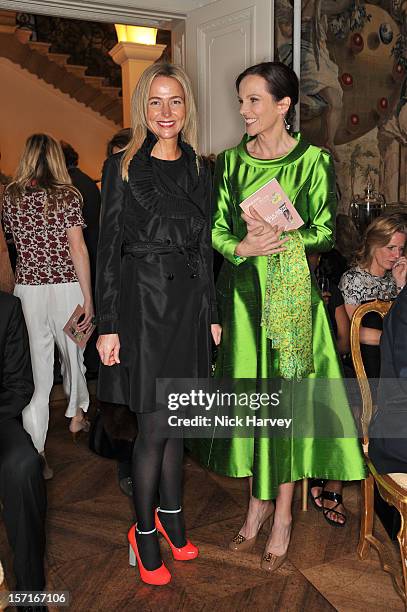 Felicia Brocklebank and Brita Fernandez Schmidt attend a catwalk show and auction hosted by Browns, Harpers Bazaar and H.E. Alain Giorgio Maria...