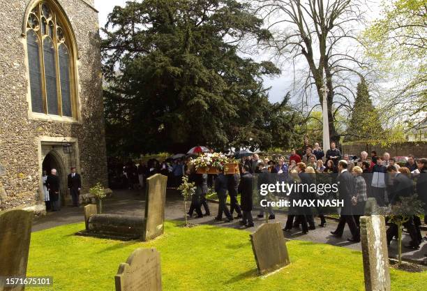 Actor Sir John Mills' coffin is carried inside the church of St. Mary The Virgin for his funeral service, 27 April 2005 in Denham. AFP PHOTO/Max Nash