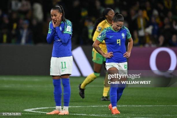 Brazil's midfielder Adriana and Brazil's forward Debinha react after the Australia and New Zealand 2023 Women's World Cup Group F football match...