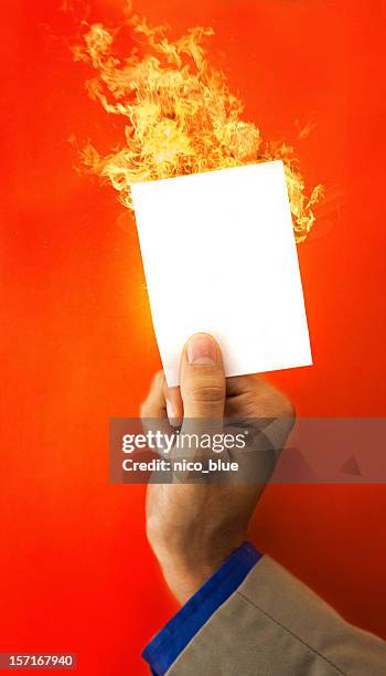 protected from the flames - paper fire stock pictures, royalty-free photos & images