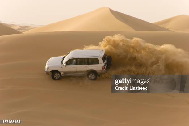 desert safari - atv sand dune stock pictures, royalty-free photos & images