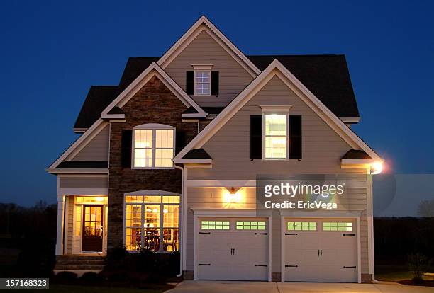 home at night - illuminated stock pictures, royalty-free photos & images