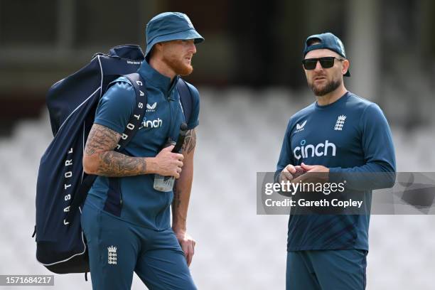 England captain Ben Stokes speaks with coach Brendon McCullum during a nets session at The Kia Oval on July 26, 2023 in London, England.