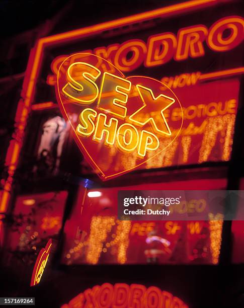 neon lights, pigalle, paris. - the place pigalle in paris stock pictures, royalty-free photos & images