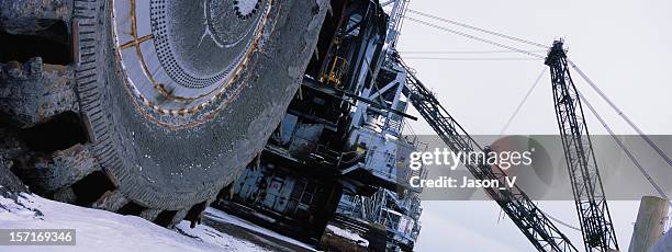 oilsands mining equipment in winter - fort mcmurray stock pictures, royalty-free photos & images