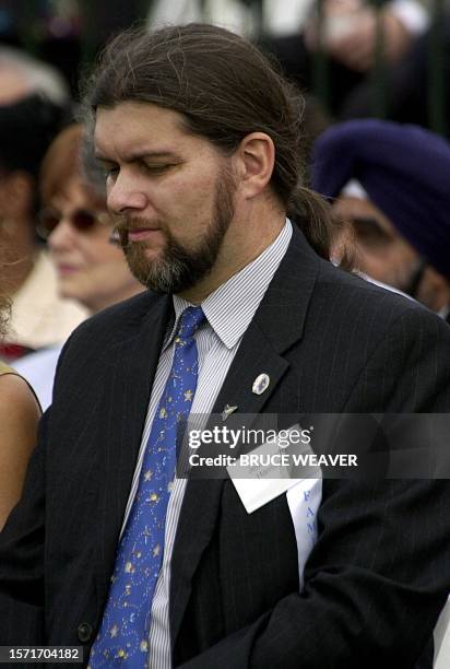 Space shuttle Columbia Astronaut Kalpana Chawla's husband, Jean Pierre Harrison, bows his head during a Memorial ceremony 28 October 2003 at the...